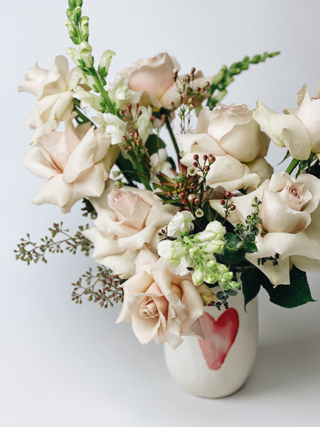 Pastels floral arrangement in a Watercolor Heart vase